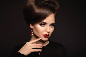 Elegant lady with ruby jewelry